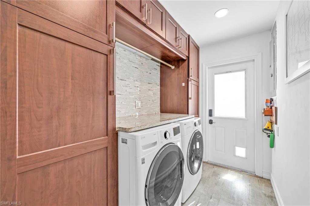 3231 13th Avenue Southwest Naples, FL 34117 - Photo 23 of 49 a utility room with dryer and washer
