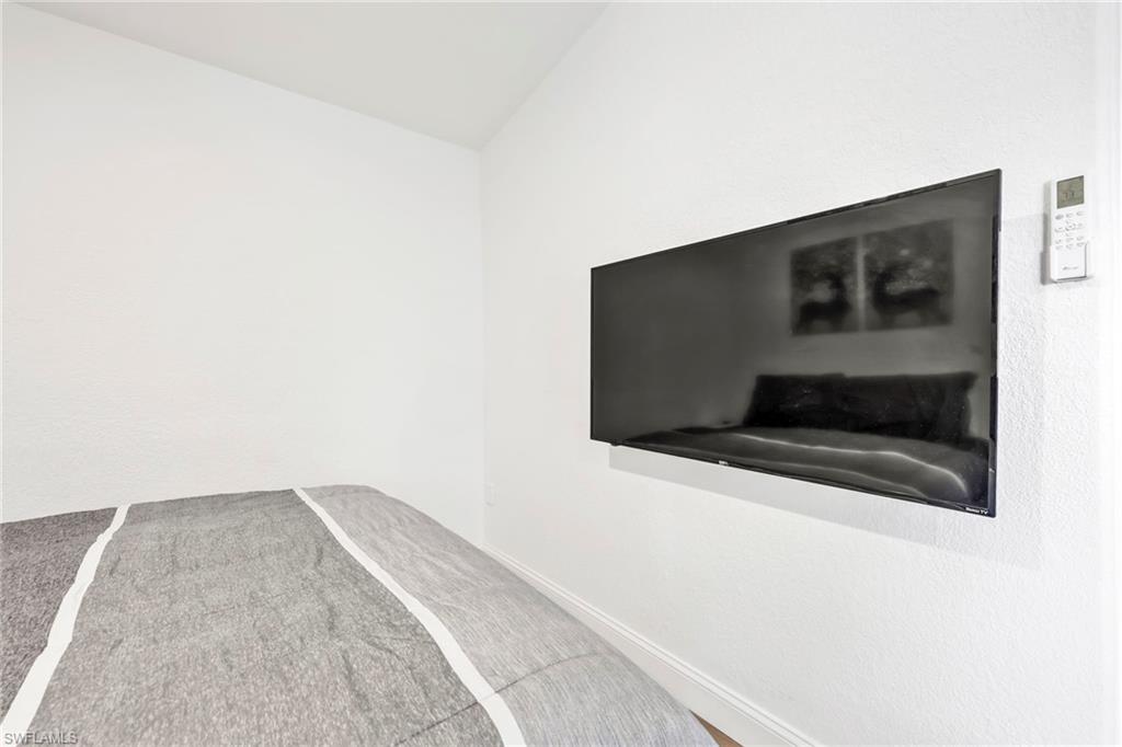 3231 13th Avenue Southwest Naples, FL 34117 - Photo 35 of 49 a view of outdoor space window and deck