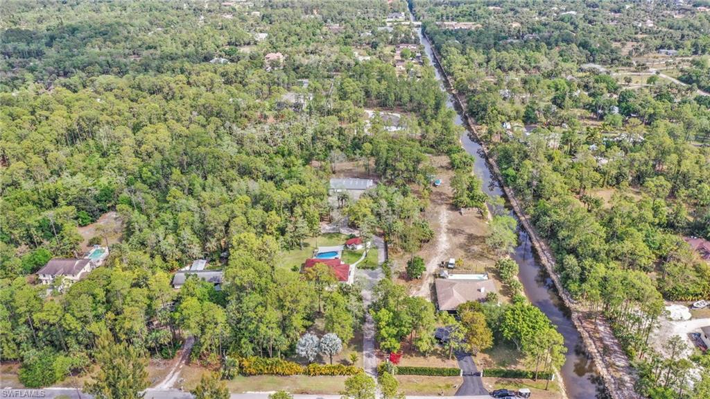 3231 13th Avenue Southwest Naples, FL 34117 - Photo 46 of 49 a view of houses with yard