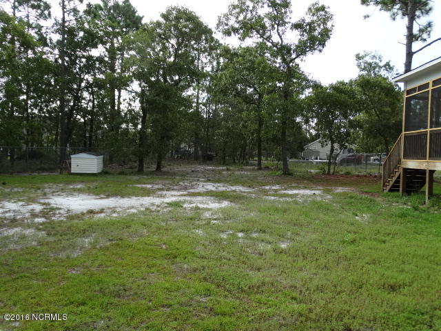 1025 Filmore Road Southport, NC 28461 - Photo 8 of 18 a7_Yard