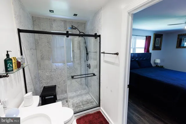 a bathroom with a sink and a shower