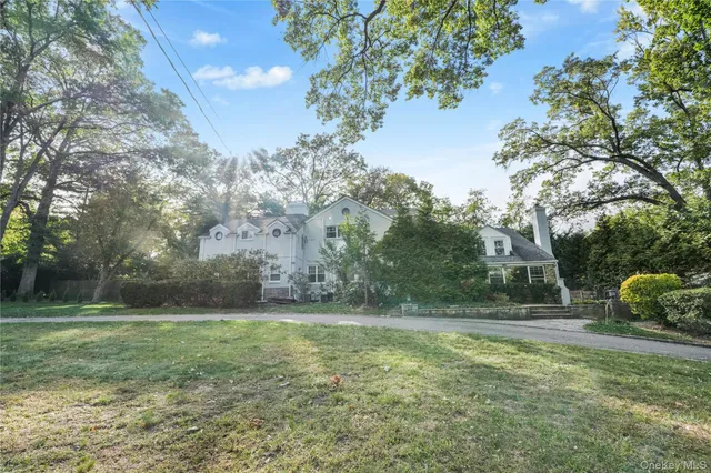 a view of outdoor space with deck and yard