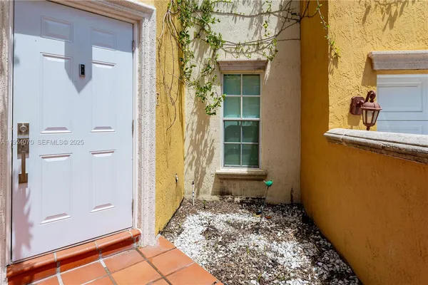 a view of a entryway door of the house