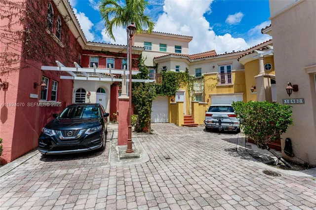 a view of a car park in front of building
