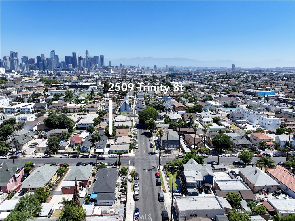 2705 Trinity Street Los Angeles, CA 90011 - Photo 6 of 7 an aerial view of a city