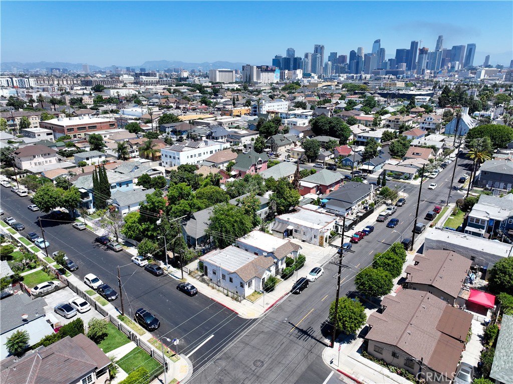 2705 Trinity Street Los Angeles, CA 90011 - Photo 7 of 7 an aerial view of a city with lots of residential buildings