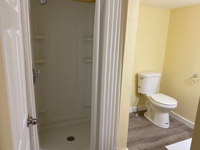 227 Bridge Street, Unit 3 Northampton, MA 01060 - Photo 13 of 19 a bathroom with a toilet and a shower