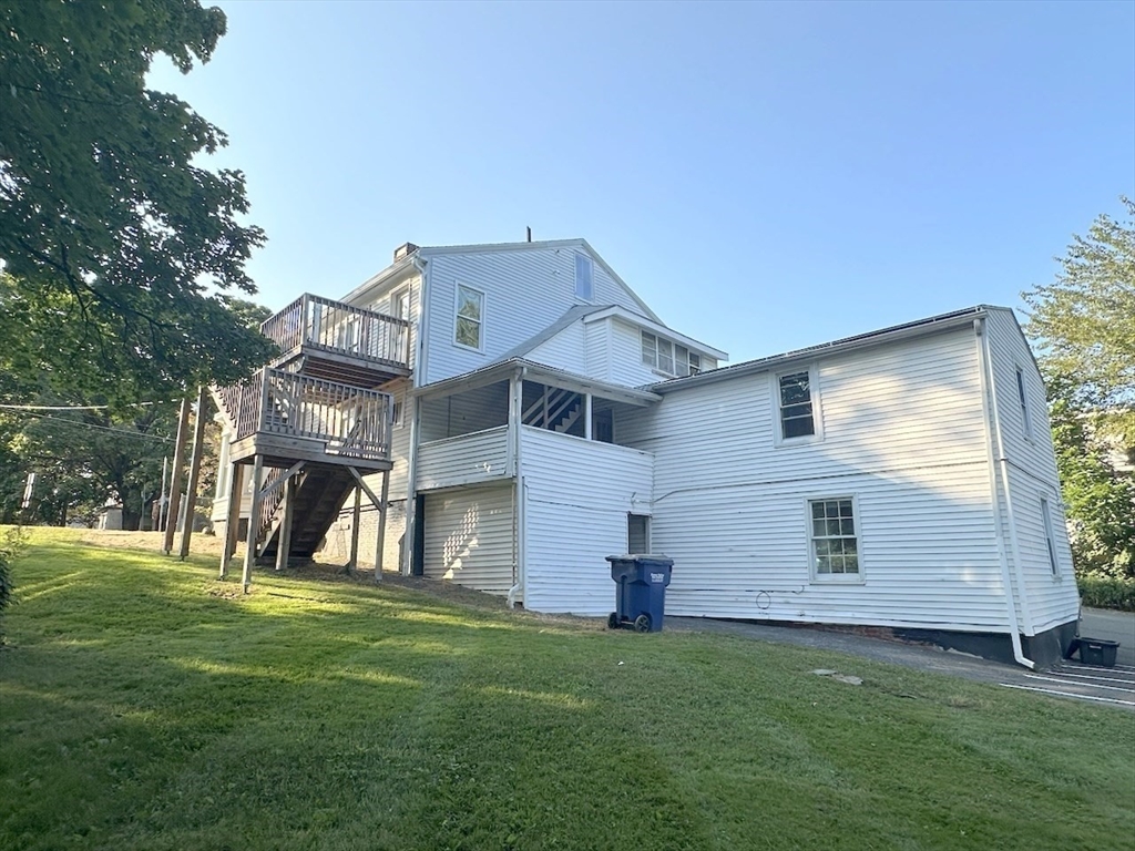 227 Bridge Street, Unit 3 Northampton, MA 01060 - Photo 3 of 19 a view of a back yard of the house