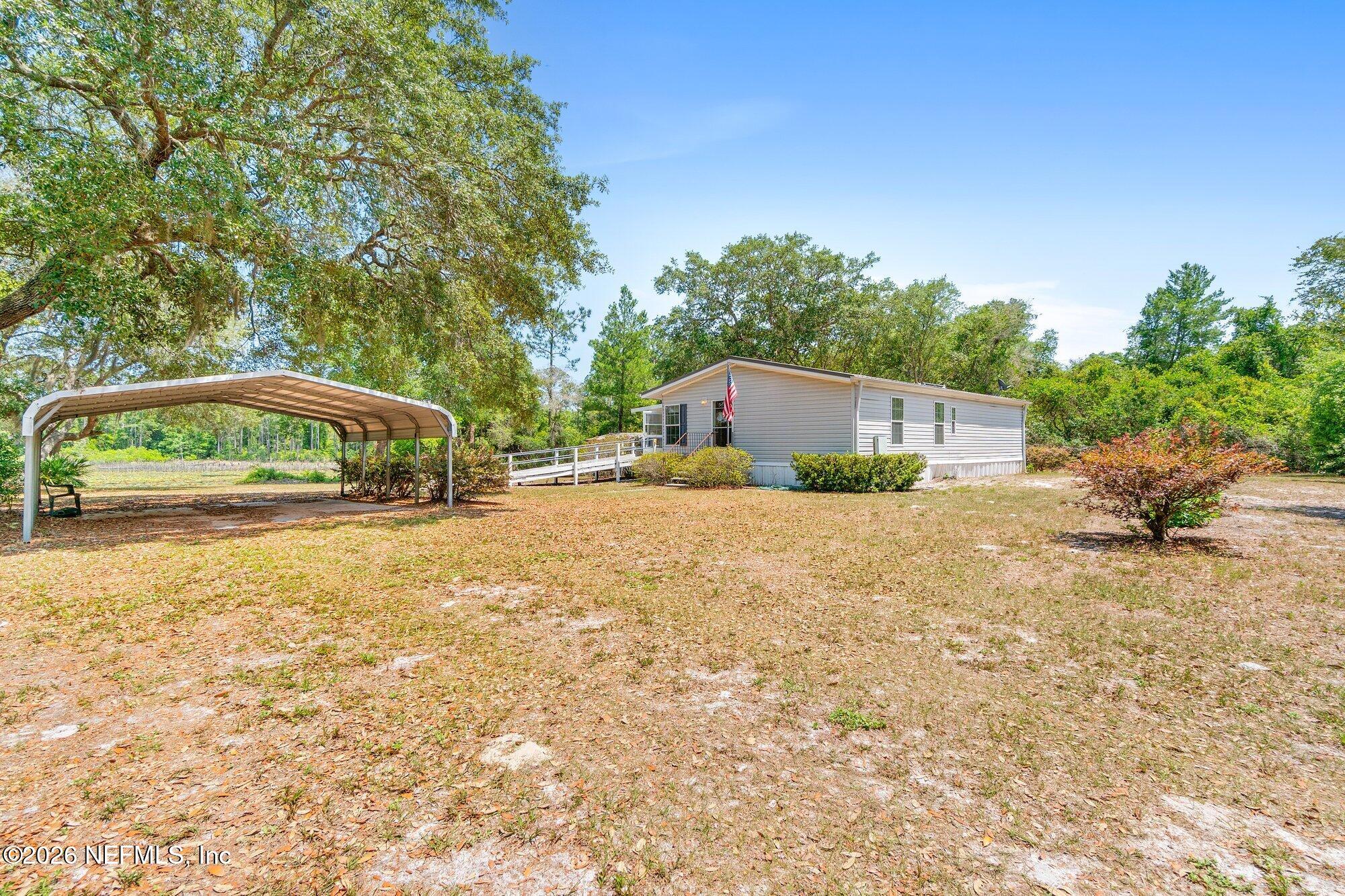 100 Mcgrady Lake Road Crescent City, FL 32112 - Photo 30 of 59 Front Yard/Carport