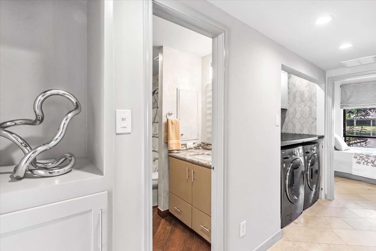 4144 Greystone Way, Unit 303 Sugar Land, TX 77479 - Photo 11 of 33 a view of a kitchen with a sink