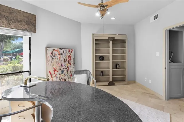 a view of a livingroom with furniture and window