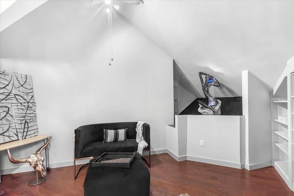 4144 Greystone Way, Unit 303 Sugar Land, TX 77479 - Photo 16 of 33 a hallway with a workspace