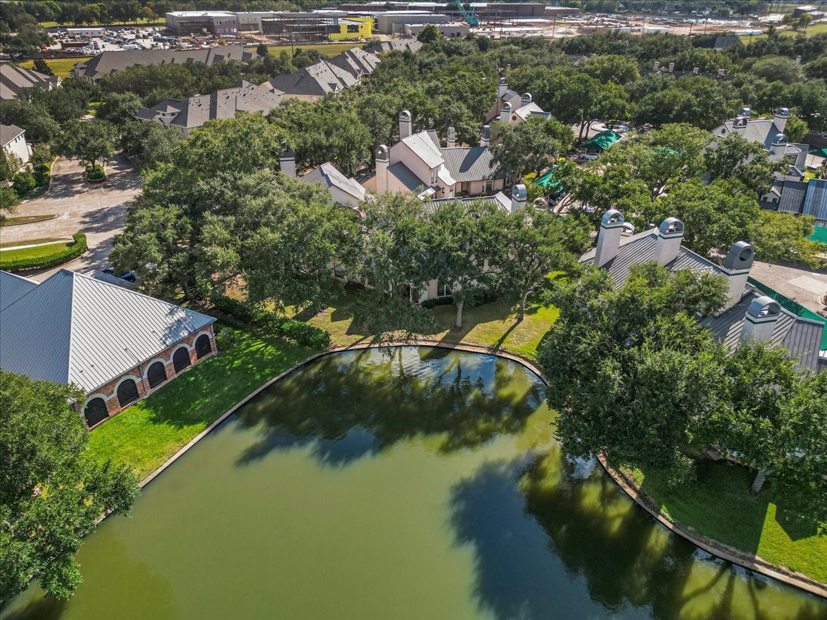 4144 Greystone Way, Unit 303 Sugar Land, TX 77479 - Photo 25 of 33 an aerial view of residential house with outdoor space and swimming pool
