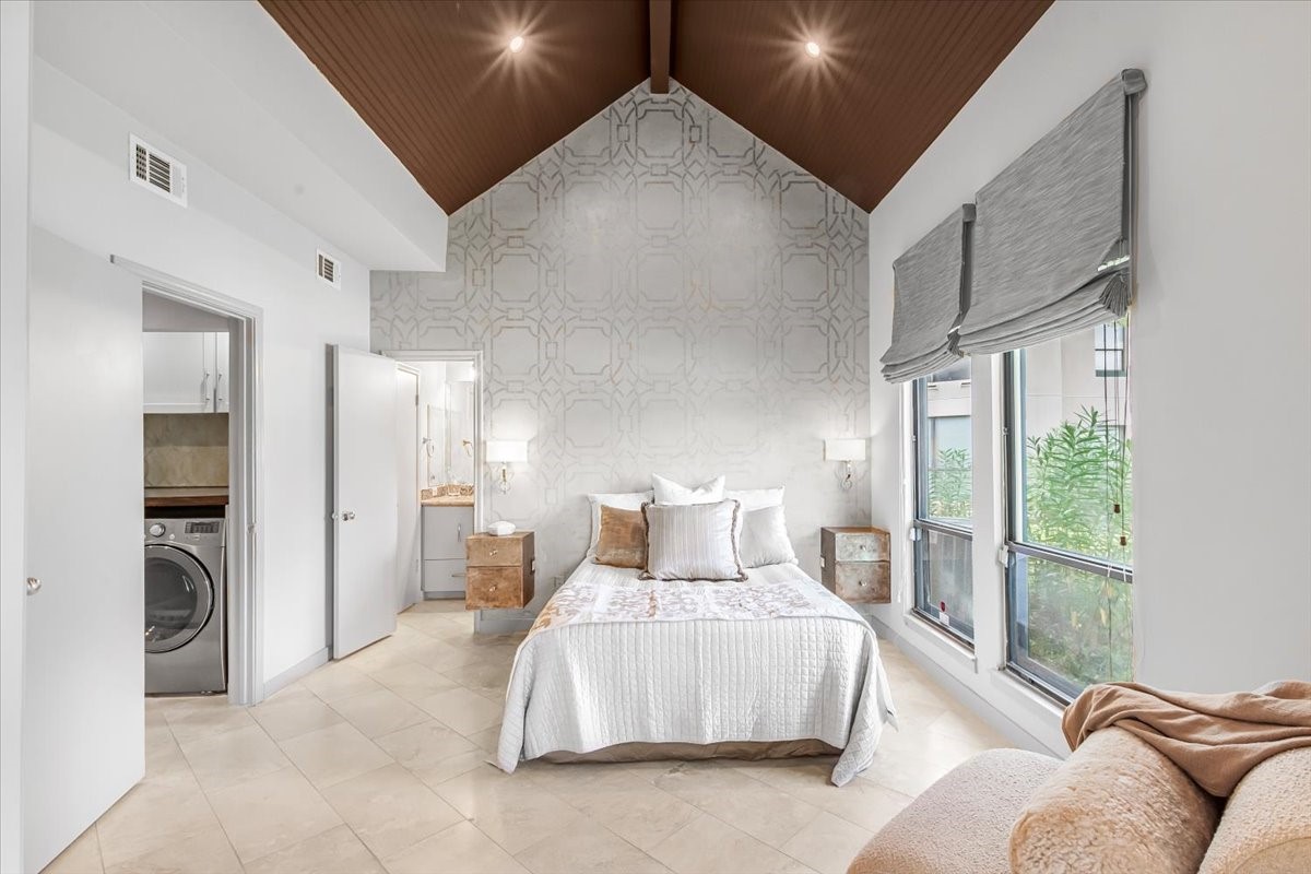 4144 Greystone Way, Unit 303 Sugar Land, TX 77479 - Photo 5 of 33 a bedroom with furniture and a large window