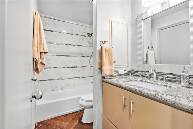 a view of a kitchen with a sink