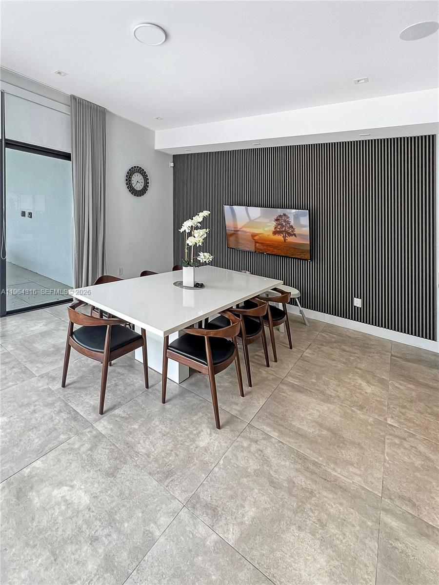 16640 Sunset Way Weston, FL 33326 - Photo 12 of 35 a view of a dining room with furniture