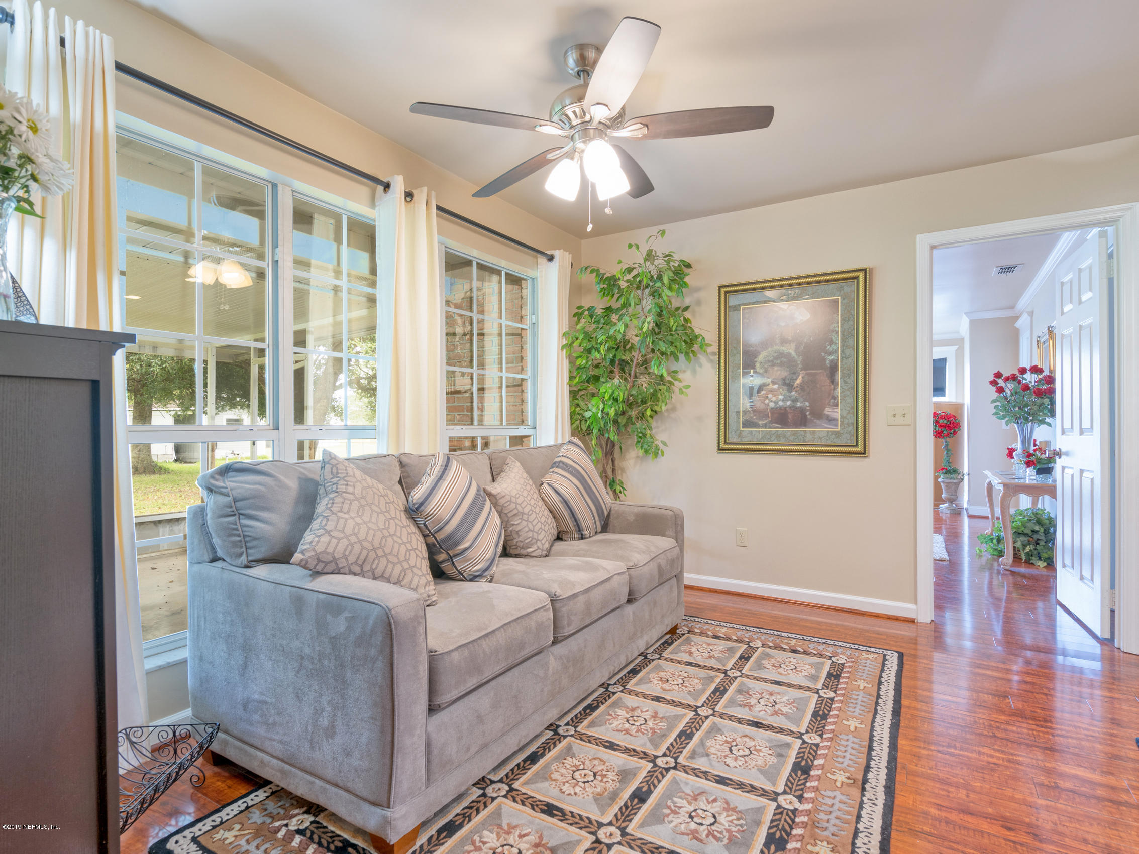54201 Church Road Callahan, FL 32011 - Photo 15 of 37 a living room with furniture and a large window