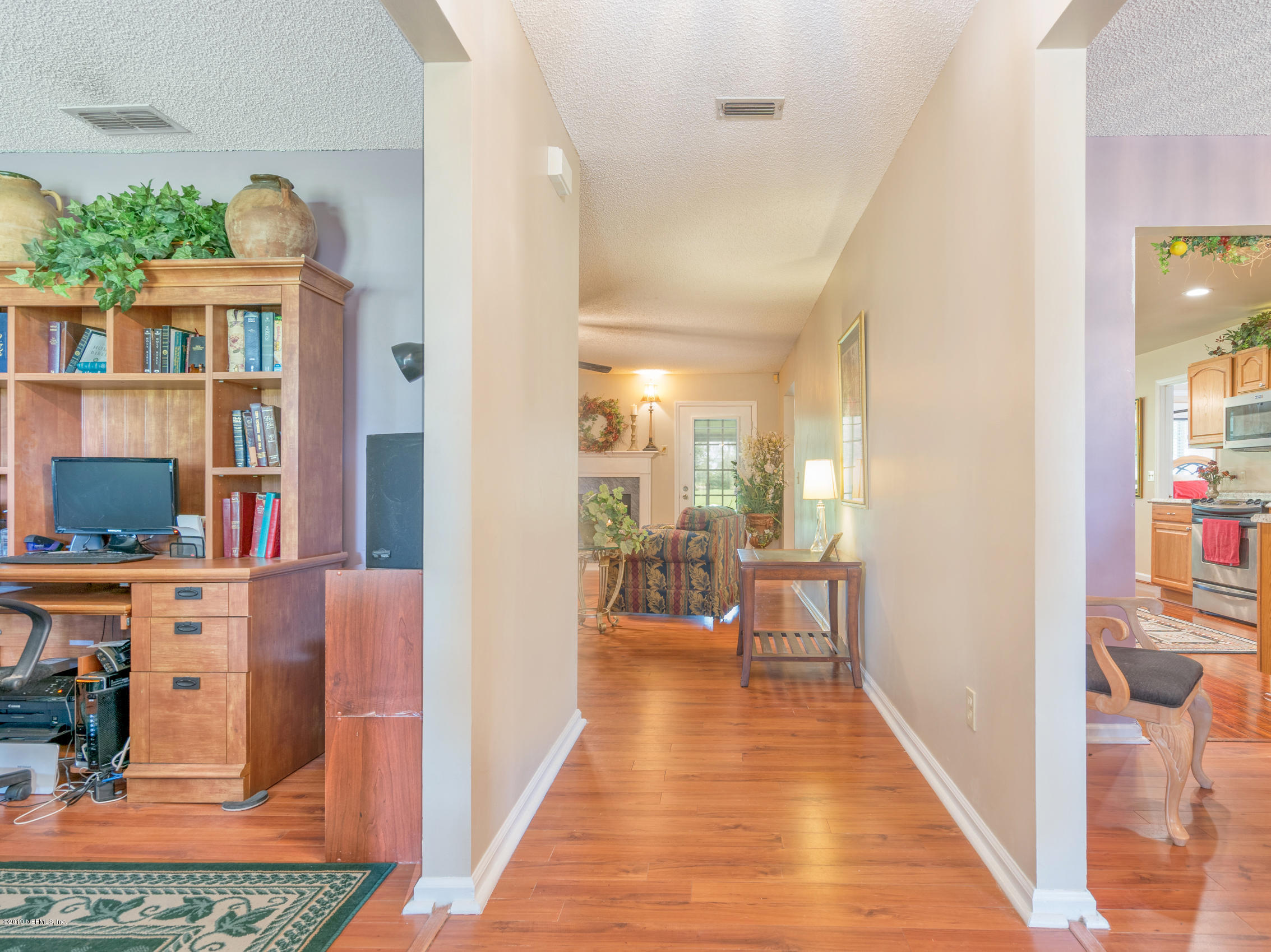 54201 Church Road Callahan, FL 32011 - Photo 2 of 37 a view of a living room and dining room