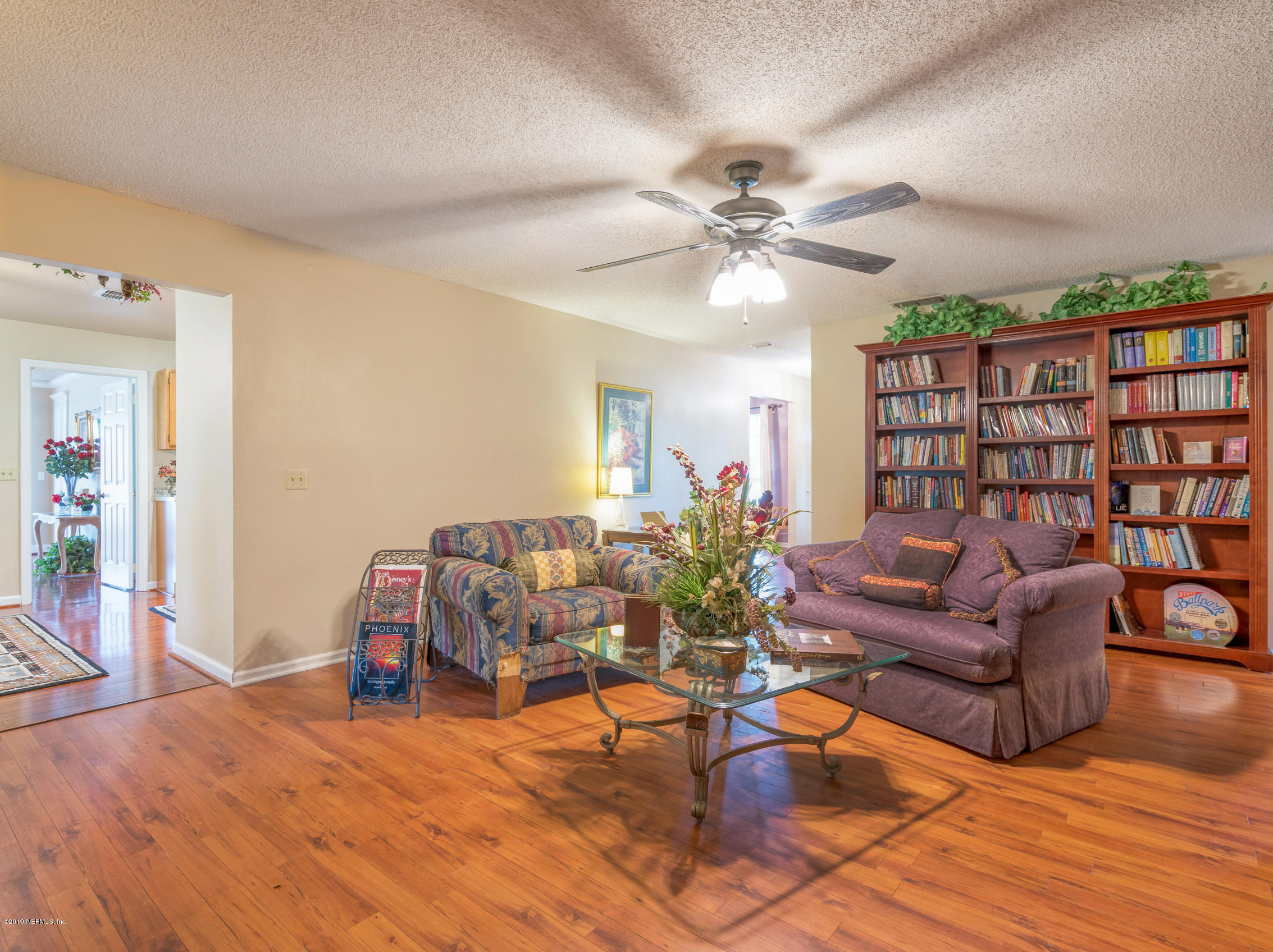54201 Church Road Callahan, FL 32011 - Photo 10 of 37 a living room with furniture and wooden floor