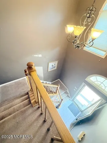 a view of a living room and dining room