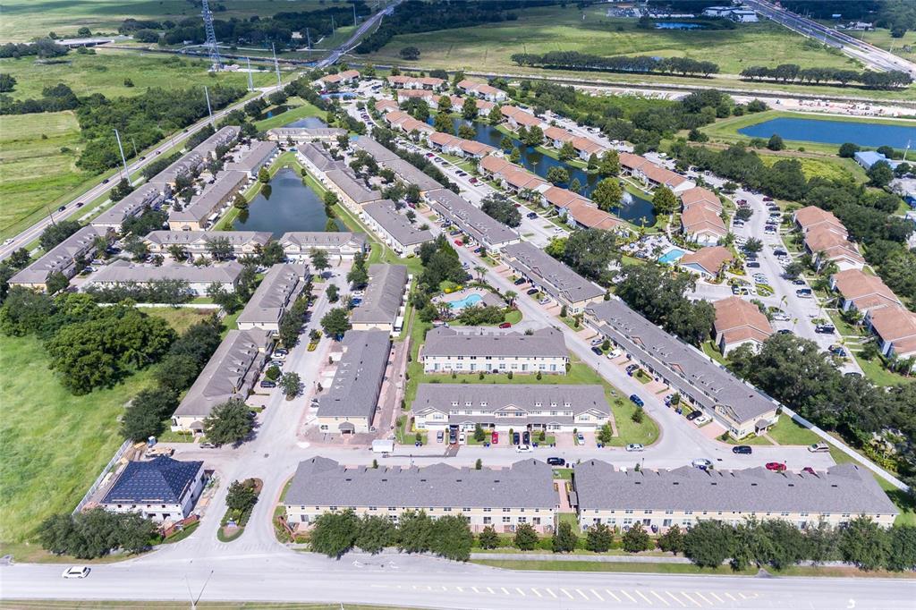 591 Pacito Way St. Cloud, FL 34769 - Photo 26 of 28 an aerial view of a city