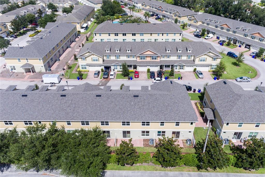 591 Pacito Way St. Cloud, FL 34769 - Photo 27 of 28 an aerial view of an buildings and street