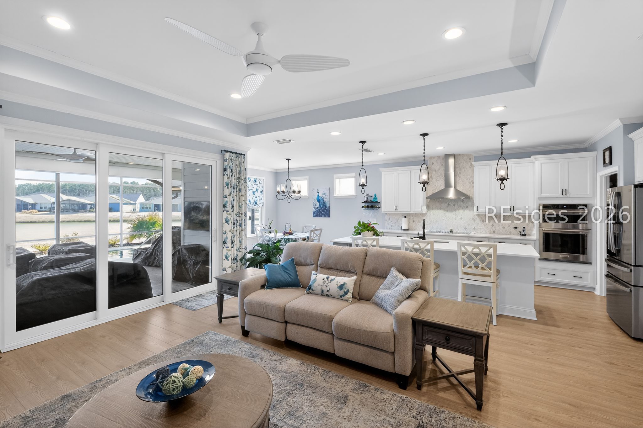 633 Destiny Drive Bluffton, SC 29909 - Photo 12 of 29 living room to 3 glass door sliders