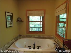 9895 Gibbs Road Clarkston, MI 48348 - Photo 36 of 75 Soak, relax and enjoy the views.