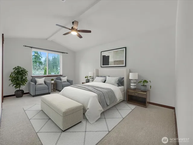 a bedroom with bed and window