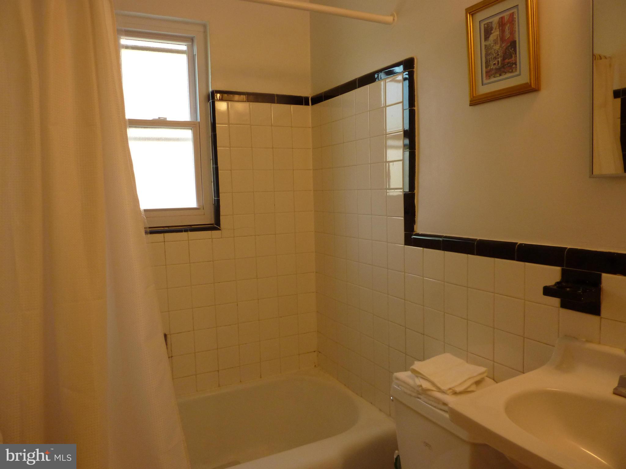 11915 Andrew Street Silver Spring, MD 20902 - Photo 14 of 25 Bright upper floor bath