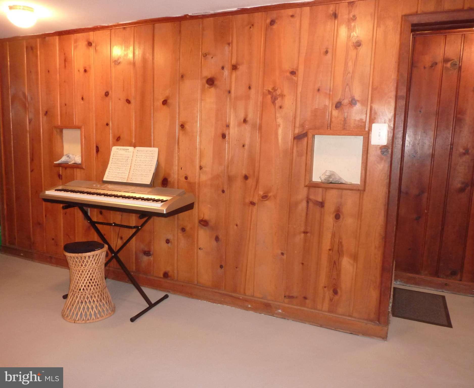 11915 Andrew Street Silver Spring, MD 20902 - Photo 19 of 25 Lovely pine paneling in basement den