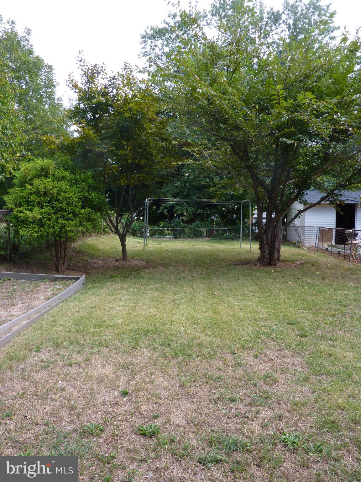 11915 Andrew Street Silver Spring, MD 20902 - Photo 24 of 25 Deep sunny backyard for games