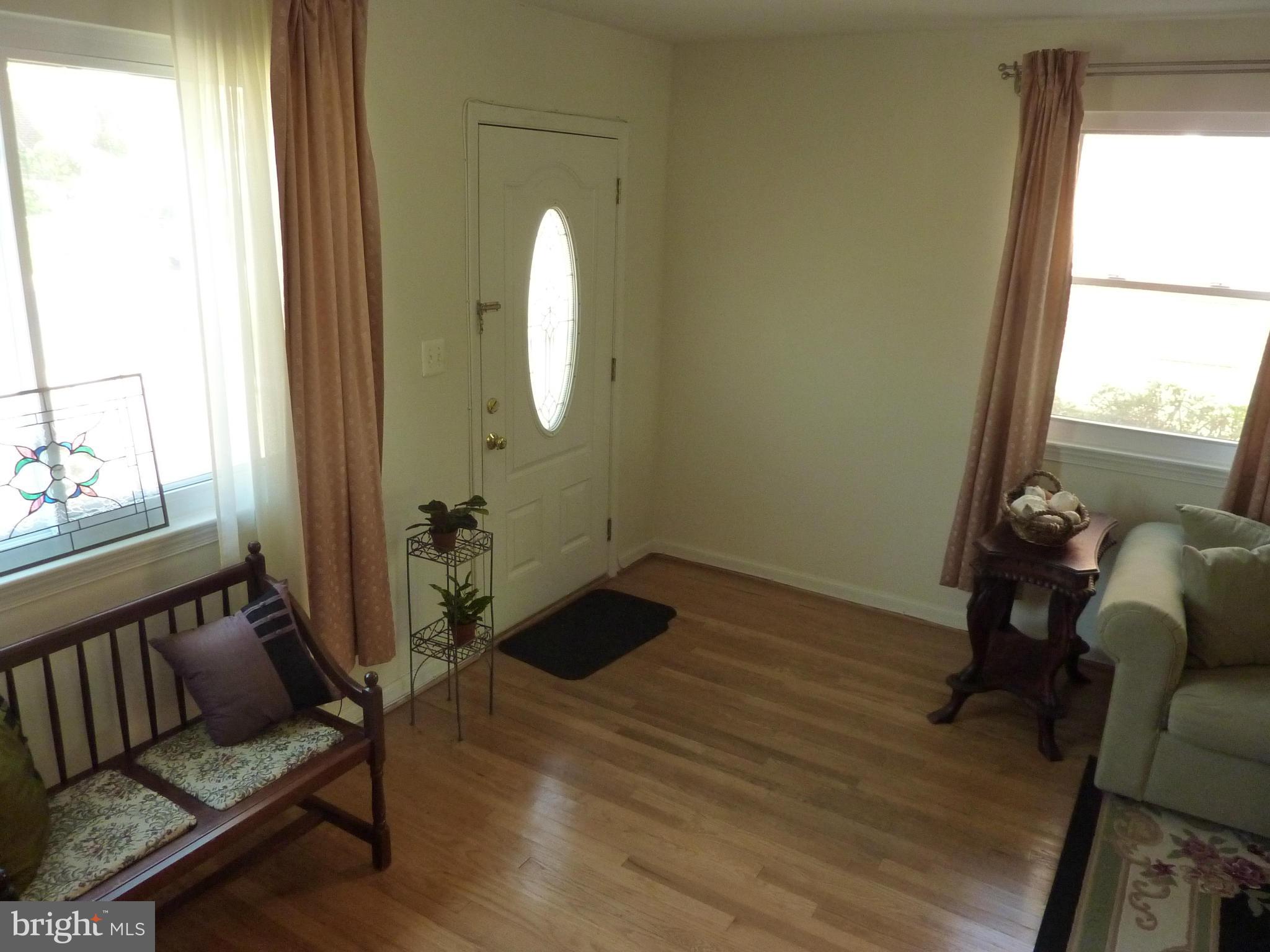 11915 Andrew Street Silver Spring, MD 20902 - Photo 6 of 25 Stairs to living room -- make an entrance!