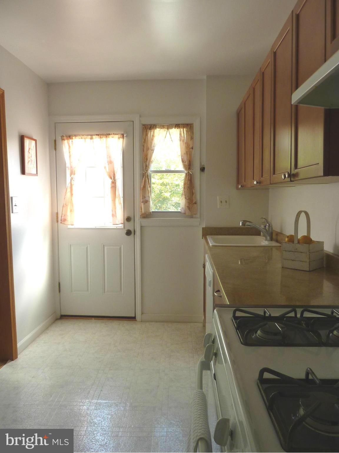 11915 Andrew Street Silver Spring, MD 20902 - Photo 9 of 25 Convenient updated gas kitchen