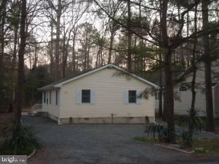20 Capetown Road Ocean Pines, MD 21811 - Photo 1 of 11 a view of a house with a yard