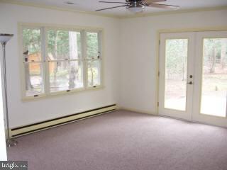 20 Capetown Road Ocean Pines, MD 21811 - Photo 5 of 11 an empty room with windows