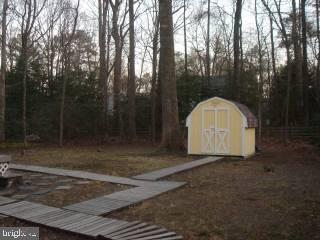 20 Capetown Road Ocean Pines, MD 21811 - Photo 8 of 11 a view of backyard with green space
