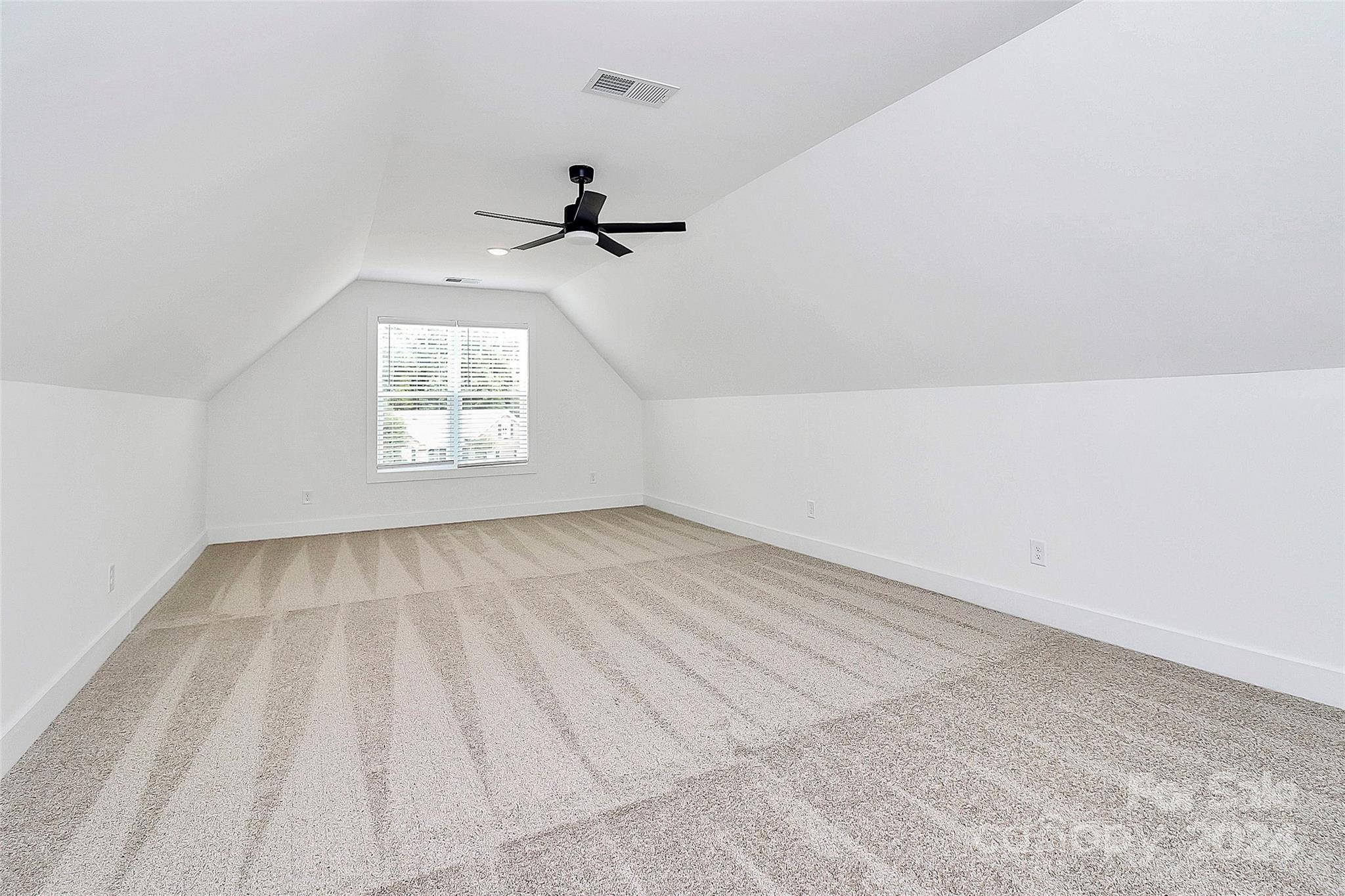 115 Starmount Drive Kings Mountain, NC 28086 - Photo 25 of 39 wooden floor in an empty room with a window