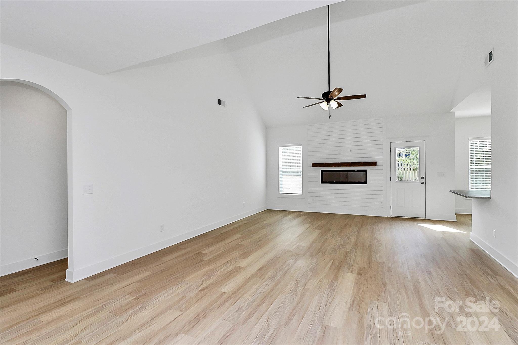 115 Starmount Drive Kings Mountain, NC 28086 - Photo 7 of 39 a view of a room with a ceiling fan wooden floor and a ceiling fan