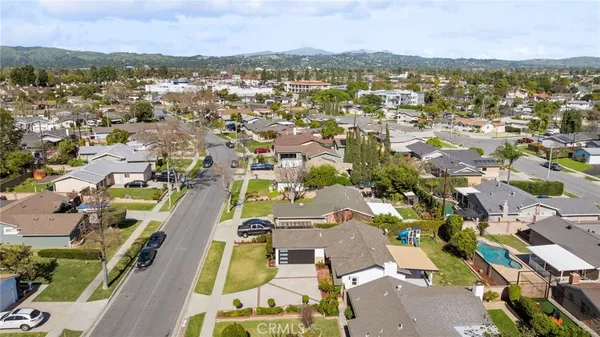 an aerial view of a city with lots of residential buildings