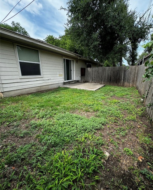 8613 Talyne Chaise Circle Austin, TX 78729 - Photo 18 of 22 Fenced backyard featuring a patio area