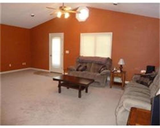 119 North Street Three Rivers, MA 01080 - Photo 5 of 6 a living room with furniture and a window