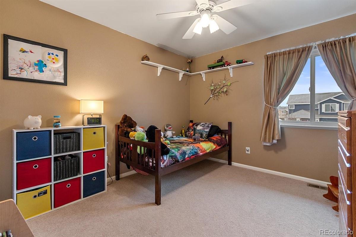 7751 Old Spec Road Peyton, CO 80831 - Photo 11 of 17 a room with furniture and air hockey table