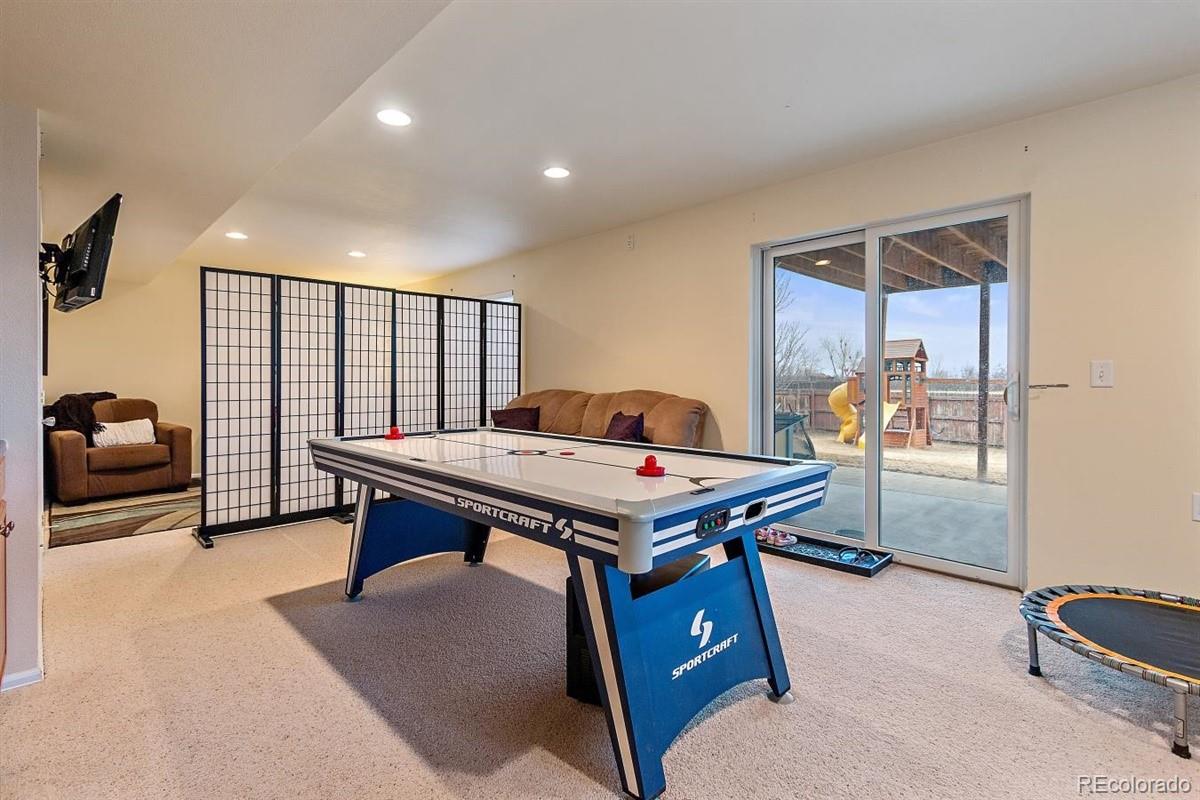 7751 Old Spec Road Peyton, CO 80831 - Photo 13 of 17 a room with furniture pool table and a table