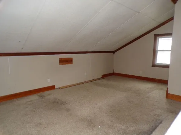 an empty room with a workbench