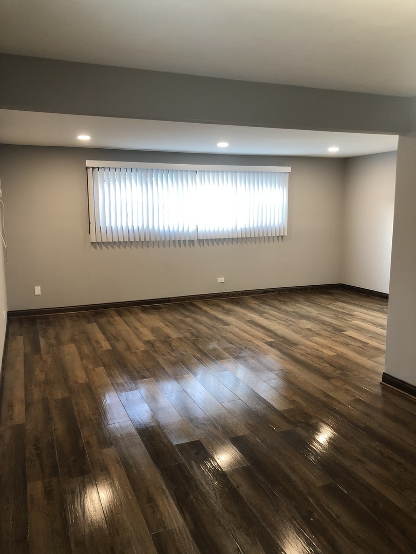 10301 McVicker Avenue Chicago Ridge, IL 60415 - Photo 11 of 21 a view of an empty room and window