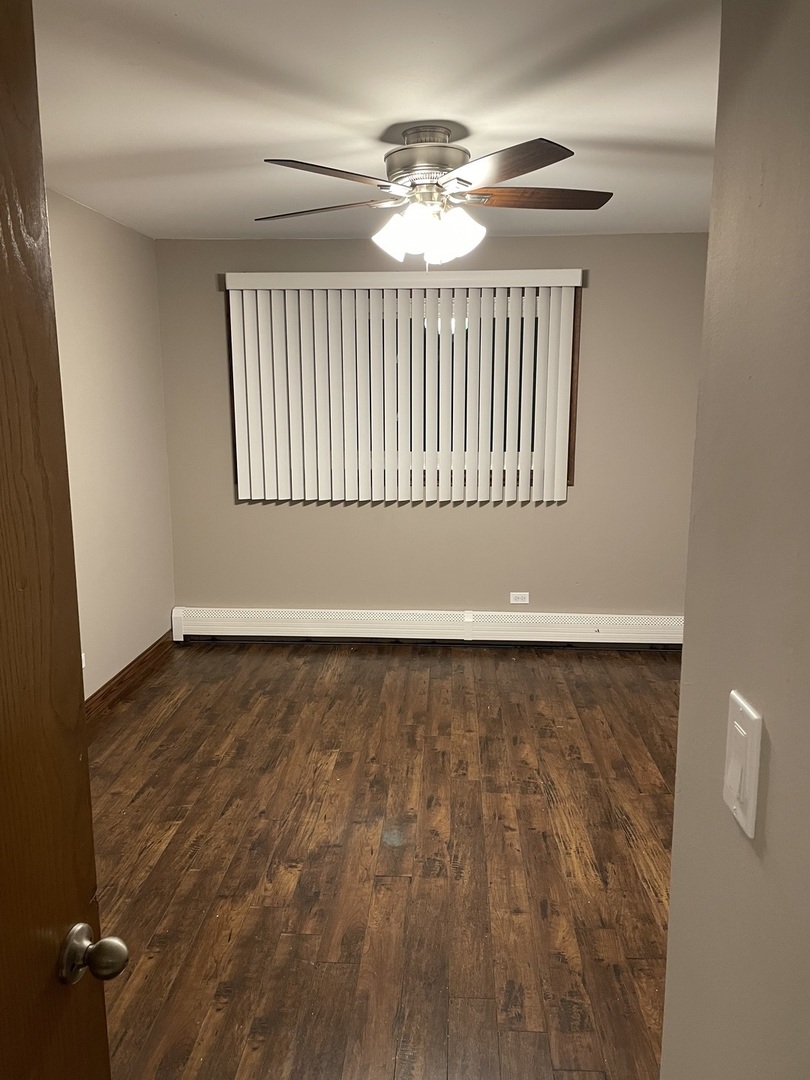 10301 McVicker Avenue Chicago Ridge, IL 60415 - Photo 15 of 21 a view of an empty room with a window