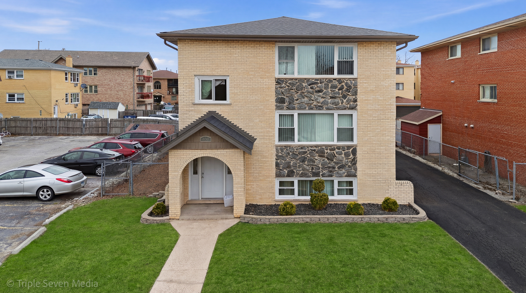 10301 McVicker Avenue Chicago Ridge, IL 60415 - Photo 2 of 21 a front view of a house with garden