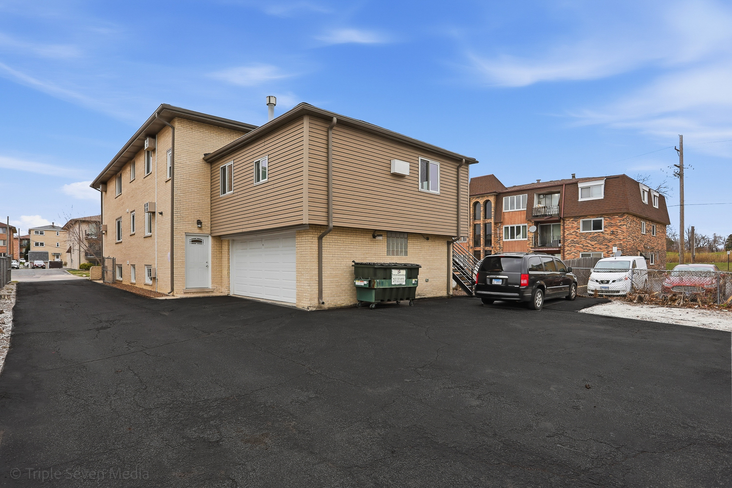 10301 McVicker Avenue Chicago Ridge, IL 60415 - Photo 3 of 21 a view of a car park in front of house