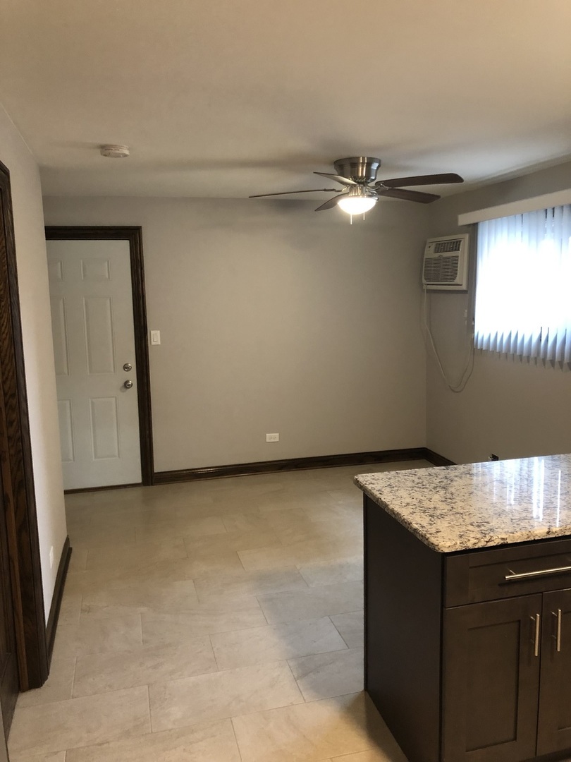 10301 McVicker Avenue Chicago Ridge, IL 60415 - Photo 8 of 21 a view of kitchen island